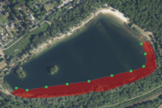 Luftaufnahme des Nymphensees mit Kennzeichung des Schutzbereichs in rot - Klick öffnet Bildbetrachter