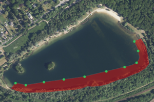 Luftaufnahme des Nymphensees mit Kennzeichung des Schutzbereichs in rot - Klick öffnet Bildbetrachter